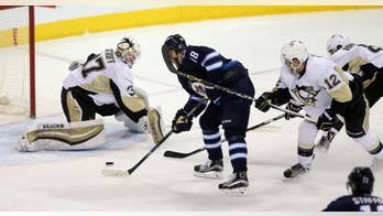 Connor Hellebuyck makes 30 saves, gets first career shutout and Jets beat Penguins 1-0