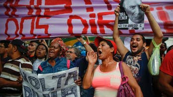 Protests in Brazil's 2 biggest cities against acting leader