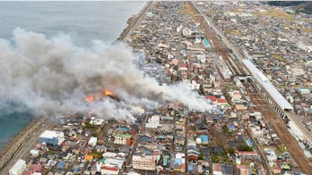 At least 140 buildings on fire in wind-swept blaze in Japan