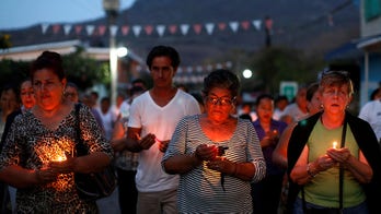 Mexican parents find drug-war mass grave, expose official indifference