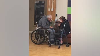 Photograph of separated elderly Canada couple gets attention