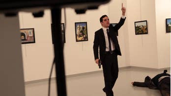 Russian ambassador to Turkey shot at photo exhibition