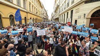 Hungary: Showdown of 'illiberal state' vs. 'open society'