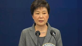 South Korean leader says she'll resign after lawmakers act