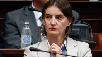 Serbia's first gay minister wants less public attention