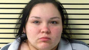 Woman charged in Oklahoma intruder deaths pleads not guilty