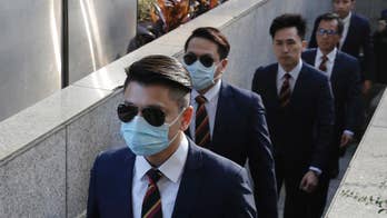 7 Hong Kong police get 2 years' prison in activist's beating