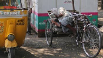 India boy, 3, survives 35-foot fall thanks to passing rickshaw, dramatic video shows