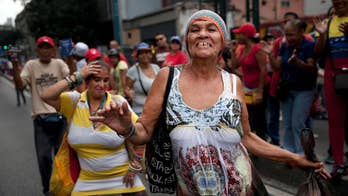 Venezuelans step up pressure on Maduro with 12-hour strike