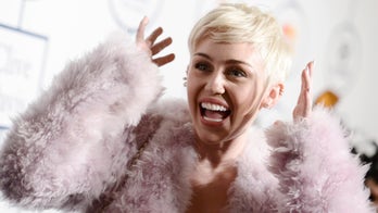 Cyrus basically calls audience old at Clive Davis party