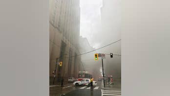 Blasts, smoke in heart of Toronto financial district