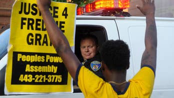 Trial of officer charged in black man's death to continue