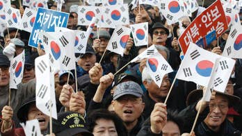 S. Korean lawmakers pass law on independent probe of Park