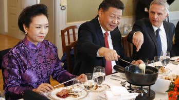 China's Xi takes spotlight at Davos as US makes transition