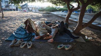 The Latest: Austria detains 22 migrants in smuggling case