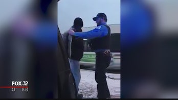 Watch: Video of Chicago cop giving man jacket to stay warm goes viral