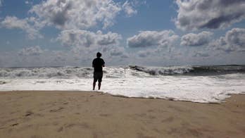 Hermine expected to weaken as it lingers offshore