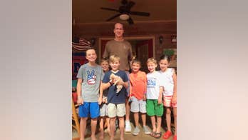 Peyton Manning adopts abused rescue dog