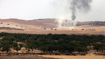 The Latest: Turkish report says ground forces enter Syria