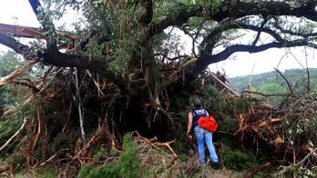 The Latest on flooding: Weather service warns of more flooding, hail, tornadoes in Oklahoma