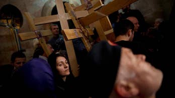 Pilgrims trace Jesus' footsteps on Good Friday in Jerusalem