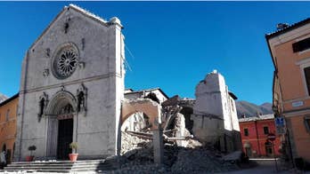 The Latest: Rescuers search collapsed buildings in Italy