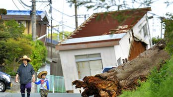 Thousands search for missing in Japan's deadly earthquakes