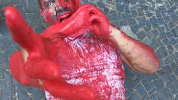 'Zombies' in Rio groan, lurch at tourists along Copacabana