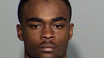 The Latest: 2 men charged in shooting death of Indianapolis pastor's wife say little in court