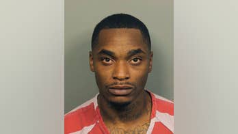 Man arrested after abducted woman escapes from trunk