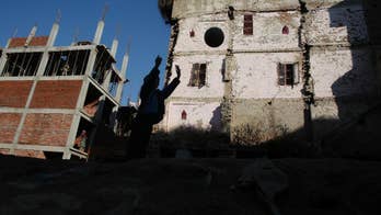 Tired of the cold wait, Nepal quake survivors rebuild