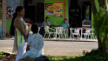 Wounds heal slowly in Colombian town engulfed by rebels