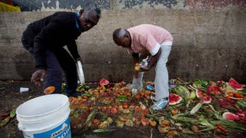 Venezuelans, facing starvation, are picking through trash for food to eat or sell