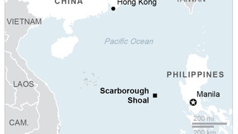 China plans 1st structure on disputed South China Sea shoal