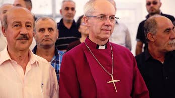Head of Anglican church visits Christian refugees in Jordan