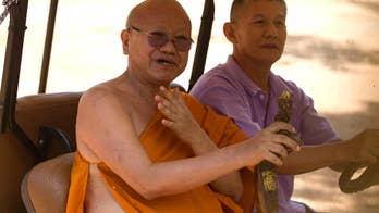 Dead tigers, stashed wealth cast spotlight on Thai monks