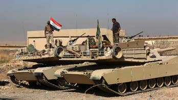 Kurds pause in Mosul offensive, say Iraqi army will advance