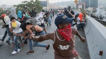 Venezuela threatens to exit OAS as pressure on Maduro mounts