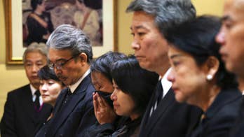 The Latest: Friday set as a holiday after Thai king's death