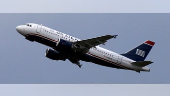 US Airways investigating pornographic toy airplane tweet