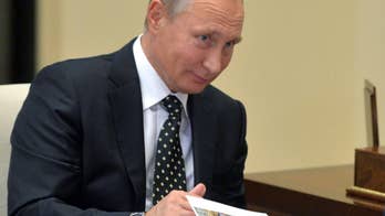 Putin, Trump speak by phone, agree to work to improve ties