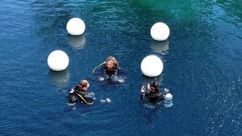 The Latest: No more exploration planned at famed Blue Hole