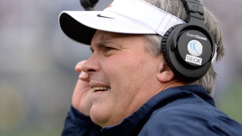 Univ of Illinois settles with ex-coach, athletes who claimed racial hostility