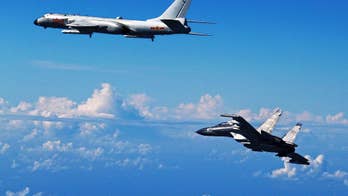 China conducts flyover of waterways near Japan, Taiwan