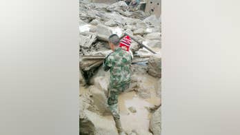 The Latest: Colombia: 112 killed after rivers overflow