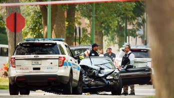 2 Chicago officers relieved of powers after suspect killed