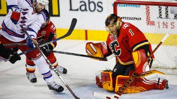 Brodie scores 2:09 into OT to lift Flames to 9th straight home win, 5-4 over Rangers