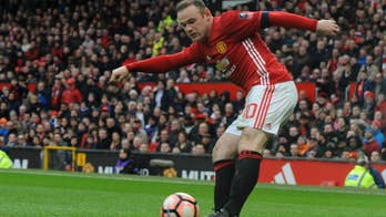 Rooney equals record as United beats Reading 4-0 in FA Cup