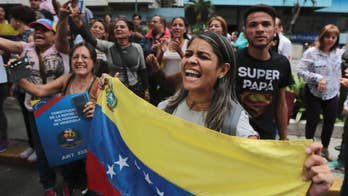 Dozens hurt, 1 dead in violent day of protests in Venezuela