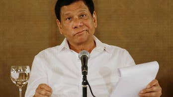 Duterte: Philippines can't stop China moves in disputed sea